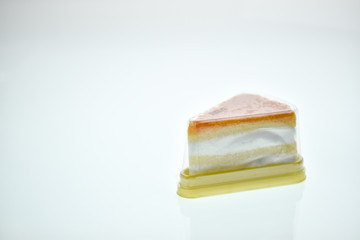 Egg Yolk Thread Cakes stuffed with cream on a white background