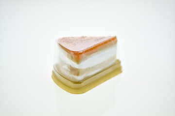 Egg Yolk Thread Cakes stuffed with cream on a white background