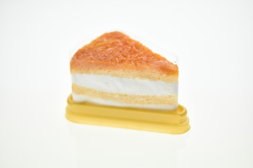 Egg Yolk Thread Cakes stuffed with cream on a white background