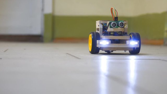 Homemade model cars rides on the floor. Designs the model of the machine or car. Modeling