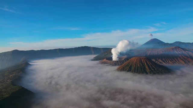 Motion time-lapse of the Mt.Bromo with the sea of fog in the morning, East Java, Indonesia.