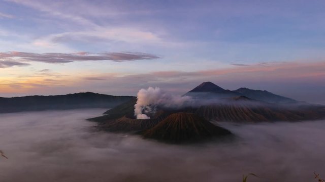 Night to day time-lapse video of the Mt.Bromo with the sea of fog, East Java, Indonesia.