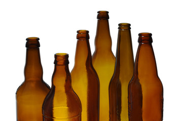 Empty beer bottles. Isolated on a colored background.