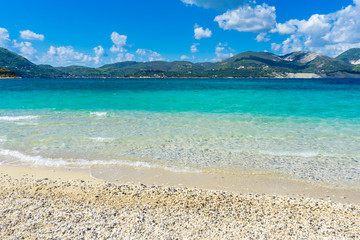 Fototapeta na wymiar Greece, Zakynthos, View to the green mountains of the island from perfect white sand beach