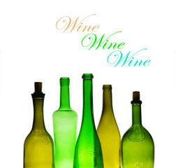 Wine bottles on a light background. A place for your text.