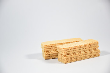Wafer candy filled with vanilla cream on a white background
