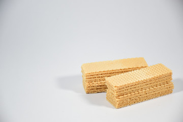 Wafer candy filled with vanilla cream on a white background