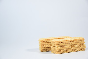 Wafer candy filled with vanilla cream on a white background