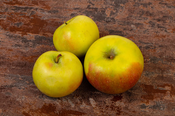 Ripe apples over background