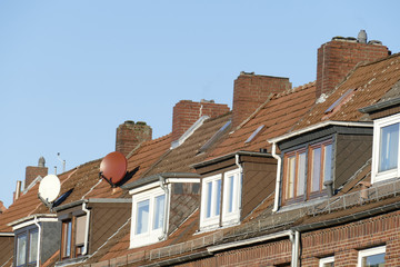 Fototapeta na wymiar Dächer, Dachfenster, Wohngebäude