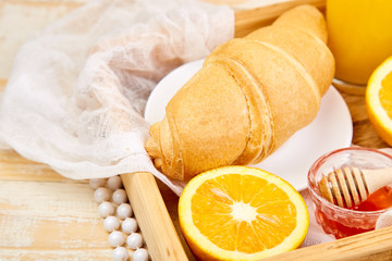 Good morning. Continental breakfast on ristic wooden background.