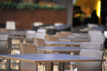 Office furniture, furniture for cafes and bars. Unsharp background