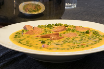 Green peas fozelek thick vegetable stew with meat, hungarian cuisine.  Traditional recept from...