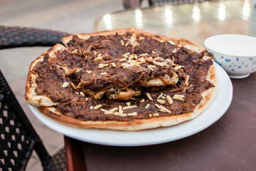 A Palestinian dish called musakhan served at a cafe in old Dubai, United Arab Emirates.