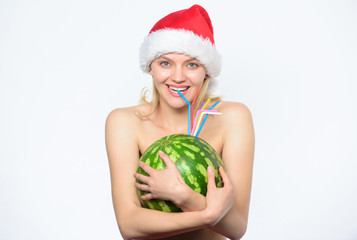 New year and christmas concept. Exotic christmas holidays. Girl attractive naked wear santa hat hug watermelon. Countries that celebrate christmas in summer. Tips to celebrate summer christmas