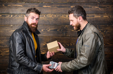 Break law. Dealer and buyer of illegal item. Buy illegal products. Cash money and box with...