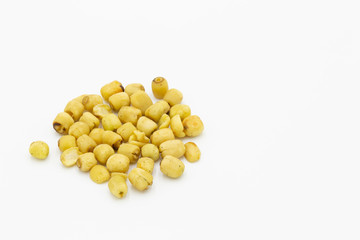 Lotus seeds roasted, Nutritious roasted lotus seeds on white background.