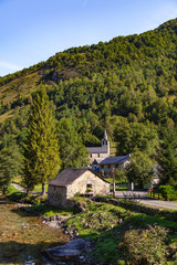 Fototapeta na wymiar View of the village of Ustou in summer, Couserans-Pyrenees, Ustou Valley, Ariège, Occitanie, France.