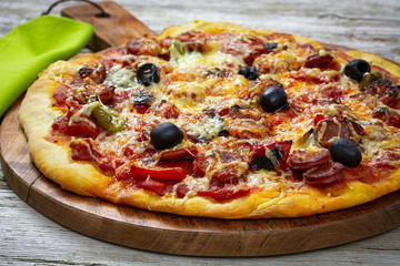pizza with salami and cheese