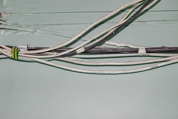 Many old white wires on the wall