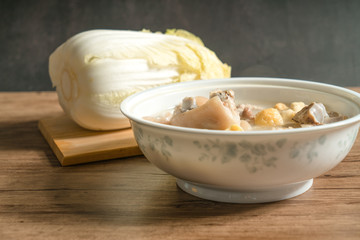 trotter soup with wooden background