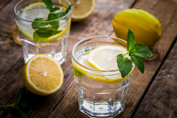 Fresh Lemonade in a Glasses with Lemon Slices and mint