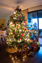christmas tree with gifts and decorations