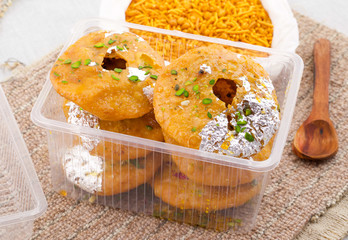 Indian Traditional Sweet Kachori Also Know As Mawa Kachori, Kachauri or Kachodi, Stuffed Kachori With Condensed Milk, Cheese and Dry Fruits And Served With Sugar Syrup