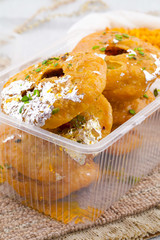 Indian Traditional Sweet Kachori Also Know As Mawa Kachori, Kachauri or Kachodi, Stuffed Kachori With Condensed Milk, Cheese and Dry Fruits And Served With Sugar Syrup