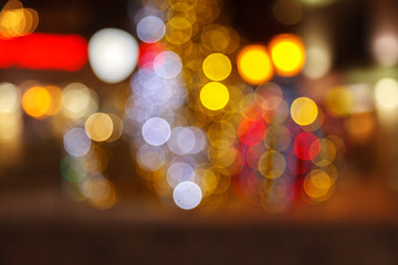 Blurred background of colored lights. Image of abstract blurred bokeh background with warm colorful lights. Christmas lights, blur, bokeh, bokeh lights, bokeh background