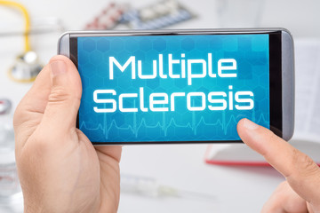 Smartphone with the text Multiole Sclerosis on the display