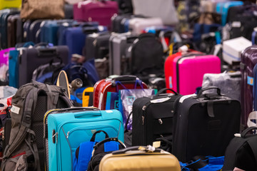 Large large amount of lost baggage at the airport.