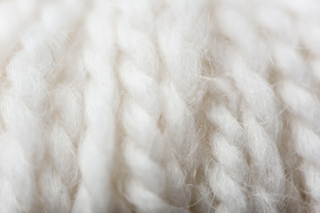 full frame of white knitting texture as backdrop