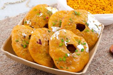 Indian Traditional Sweet Kachori Also Know As Mawa Kachori, Kachauri or Kachodi, Stuffed Kachori With Condensed Milk, Cheese and Dry Fruits And Served With Sugar Syrup