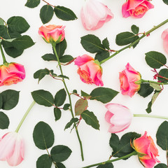 Floral pattern of roses flowers isolated on white background. Valentines day composition. Flat lay, top view.