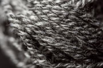 full frame of grey yarn texture as background