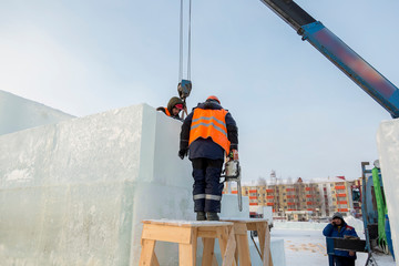 Workers on the installation of the ice town