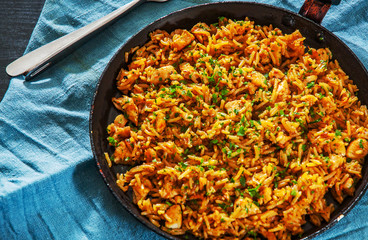 Chicken Breast with Rice and vegetables in a frying pan