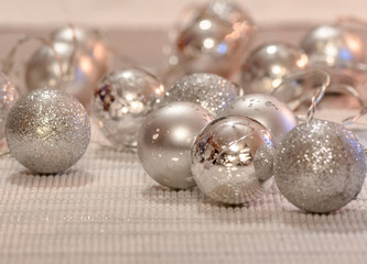 silver christmas balls on white background