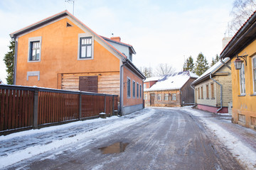 Old town buildings, street and urban view. Winter and snow. Travel photo 2018.