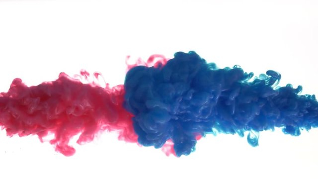 Blue and red ink mixing in water, Slow motion

