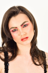 Glamorous makeup look. Sexy woman with color cosmetics. Beauty model with glamour look. A beauty of a girl. Pretty woman wear creative makeup. Applying decorative cosmetics and makeup