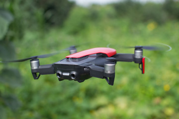 Red drone flying