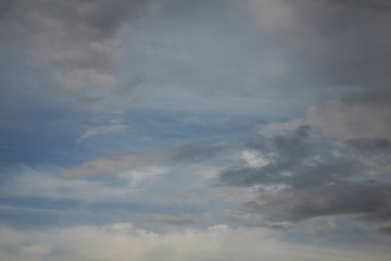 Fototapeta premium Clouds and sky fluffy and light as air. The beautiful background on the picture of the horizon is painted in blue. The best clouds. 