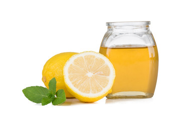 Honey, lemon and mint on white background. Fruit, citrus