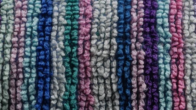 Colorful horizontal stripes closeup texture of a beach towel