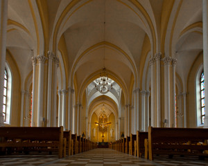 Fototapeta premium Vaults, benches and divine light in the altar