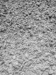 Gray plaster coat on the wall as a background