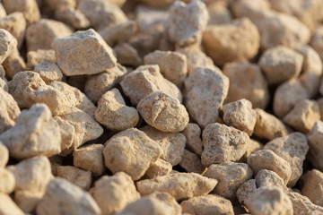 White gravel on a construction site as an abstract background
