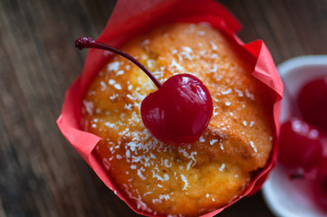 Mafina with cherries in a red wrapper. Different angles 